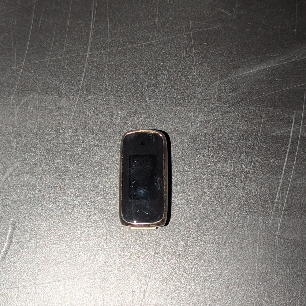 Gold Special Addition Fitbit Luxe With 2 Band Sets And Charger.